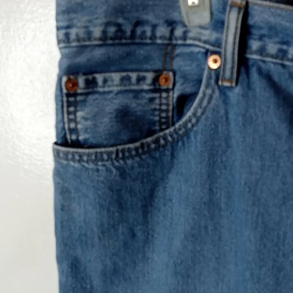 Levi 550 men's size 42X32 relaxed fit denim jeans. Athleisure